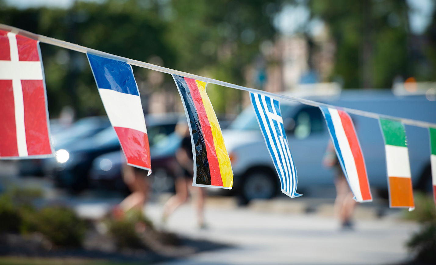 international flag banners hanging on campus